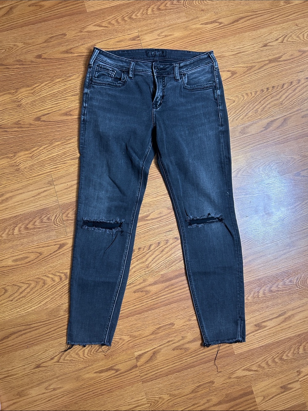 Silver Jeans Washed Black Skinny Jeans with Knee Rips